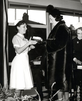 Brenda Sharp receiving a prize from Barbara Cartland c1965