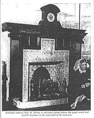 Black and white photograph of a large fireplace | Hertfordshire Archives & Local Studies