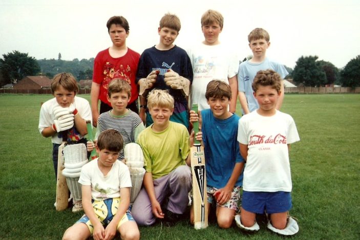 Colour photograph of a boys' cricket team